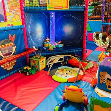 Children enjoying The Play Factory indoor play area